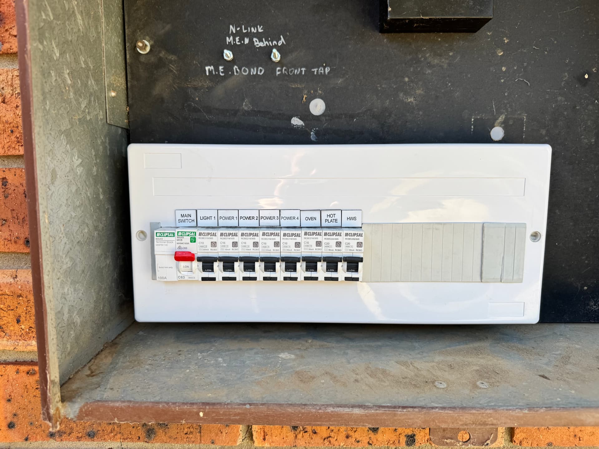 Upgraded Clipsal switchboard with labelled RCBO safety switches installed by MTK Electrics & Air in Canberra