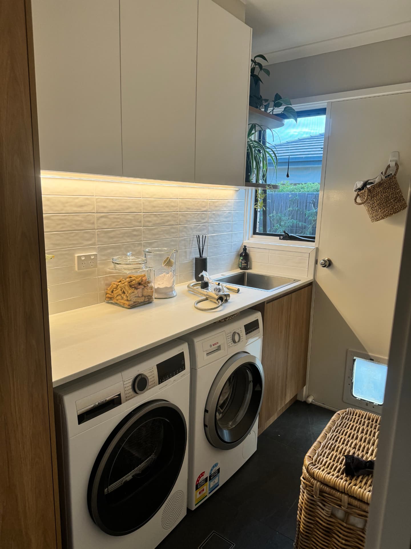 Tuggeranong laundry with under-cabinet LED strip lighting and power points installed by MTK Electrics & Air