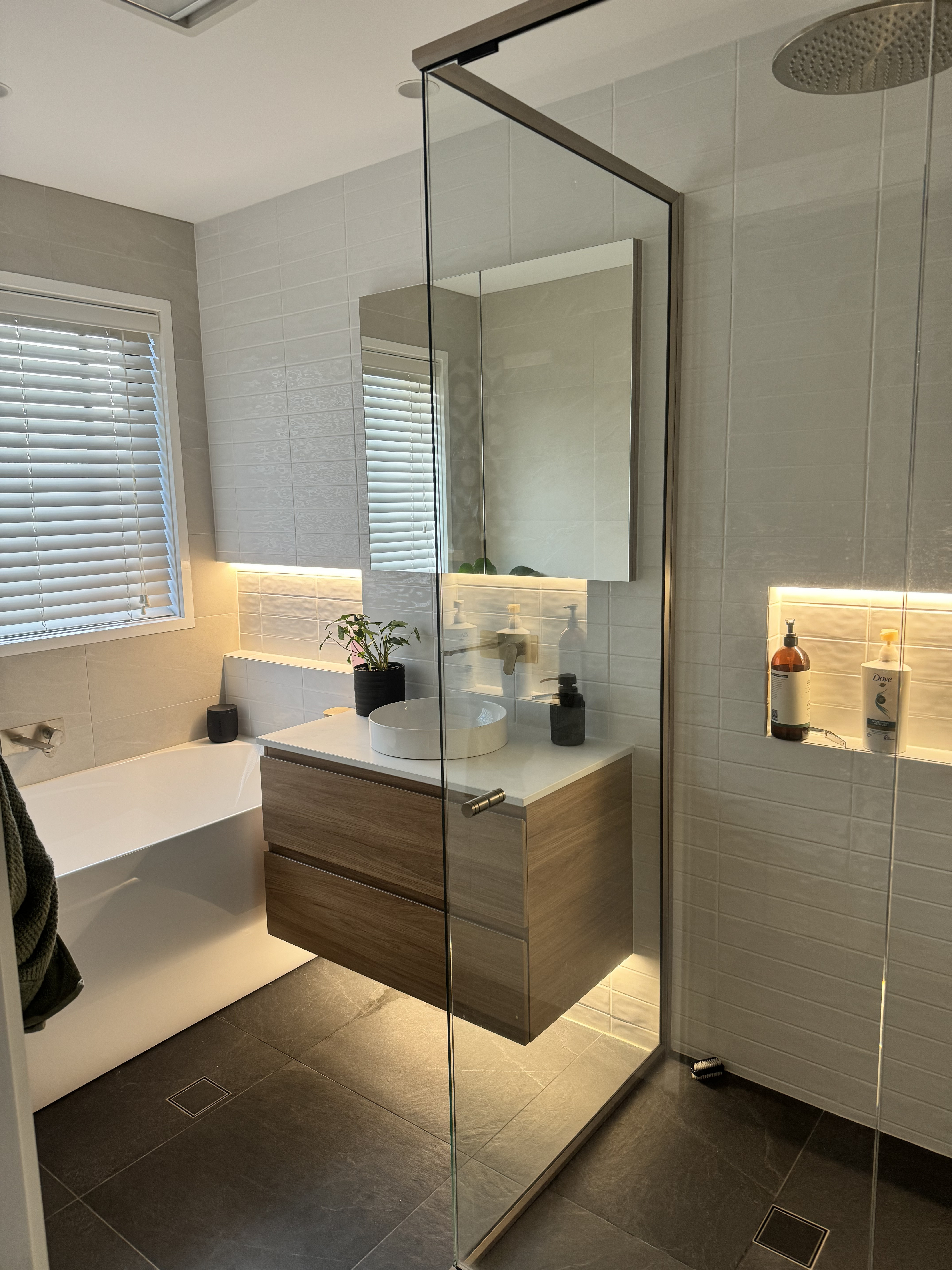 Warm LED strip lighting installed by MTK Electrics & Air in a Canberra bathroom